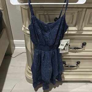 Navy dress with silver sparkles! Ruffles at the bottom!